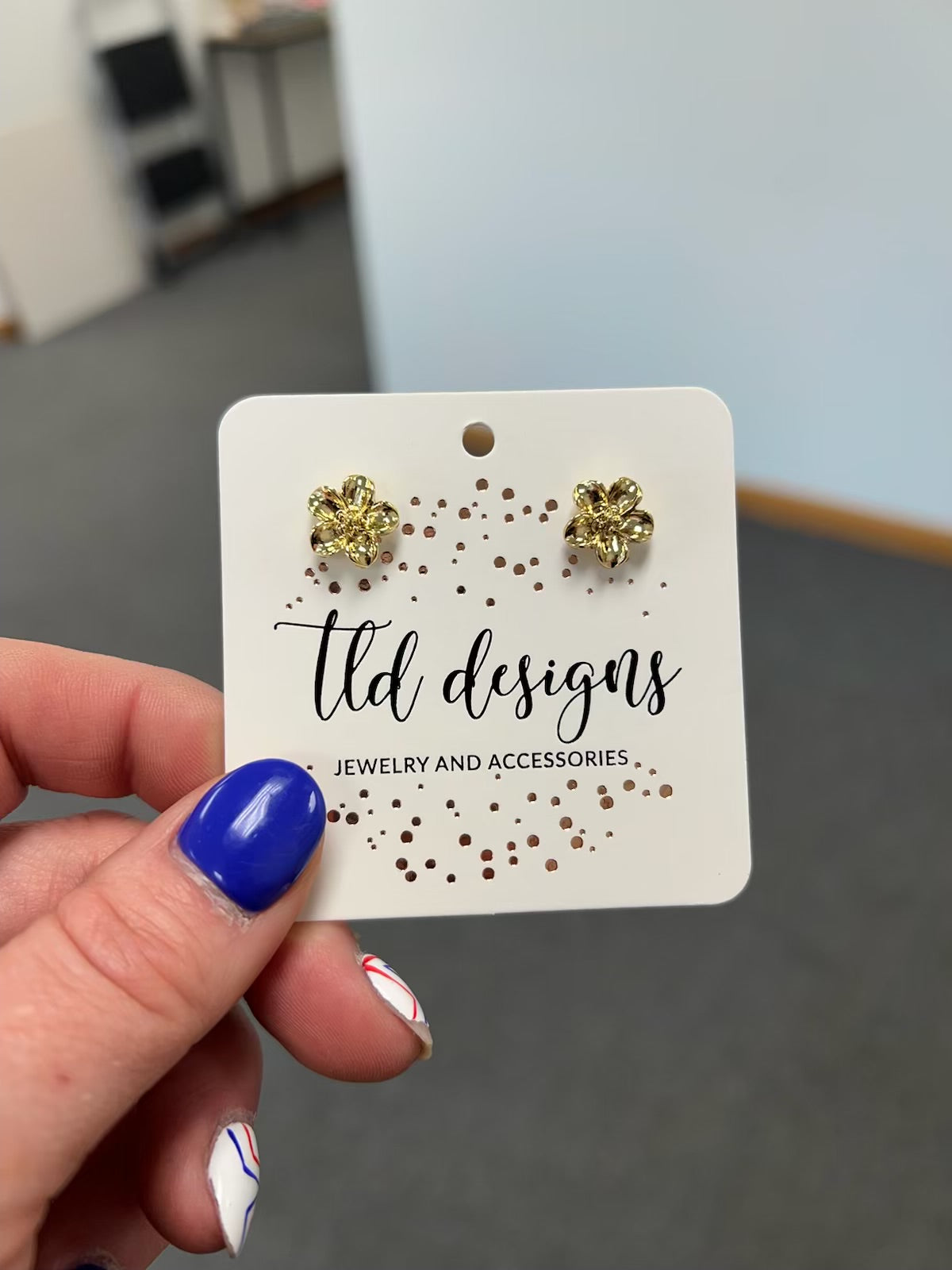 Golden floral studs