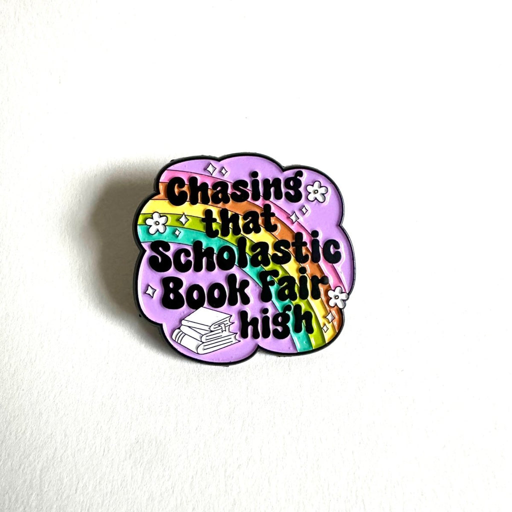 Chasing That Scholastic Book Fair High Enamel Pin, 1.3” x 1.3”