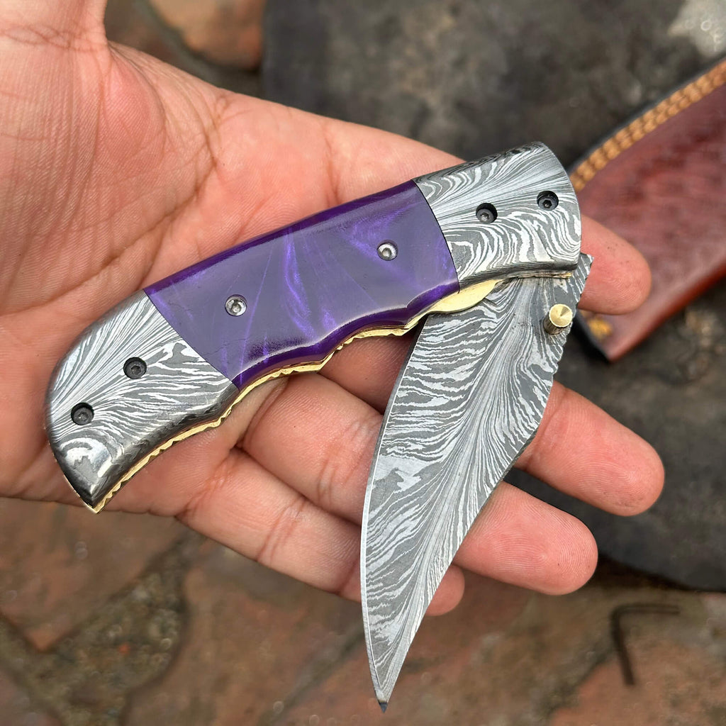 Handmade Feather Pattern Damascus Folding Knife with Purple Resin Handle & Leather Sheath