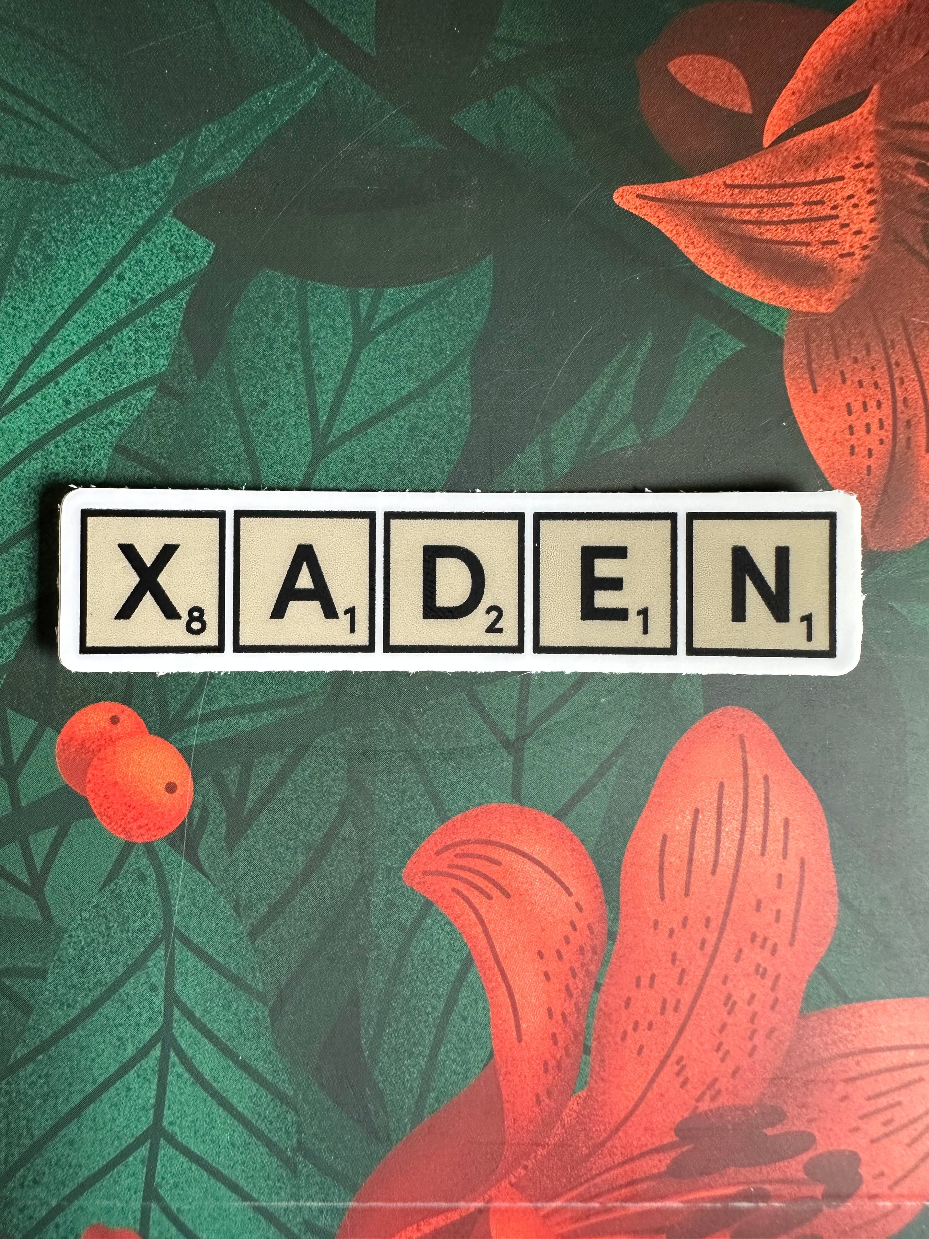 Xaden Game Tiles Vinyl Sticker, 3.0” x 0.68”