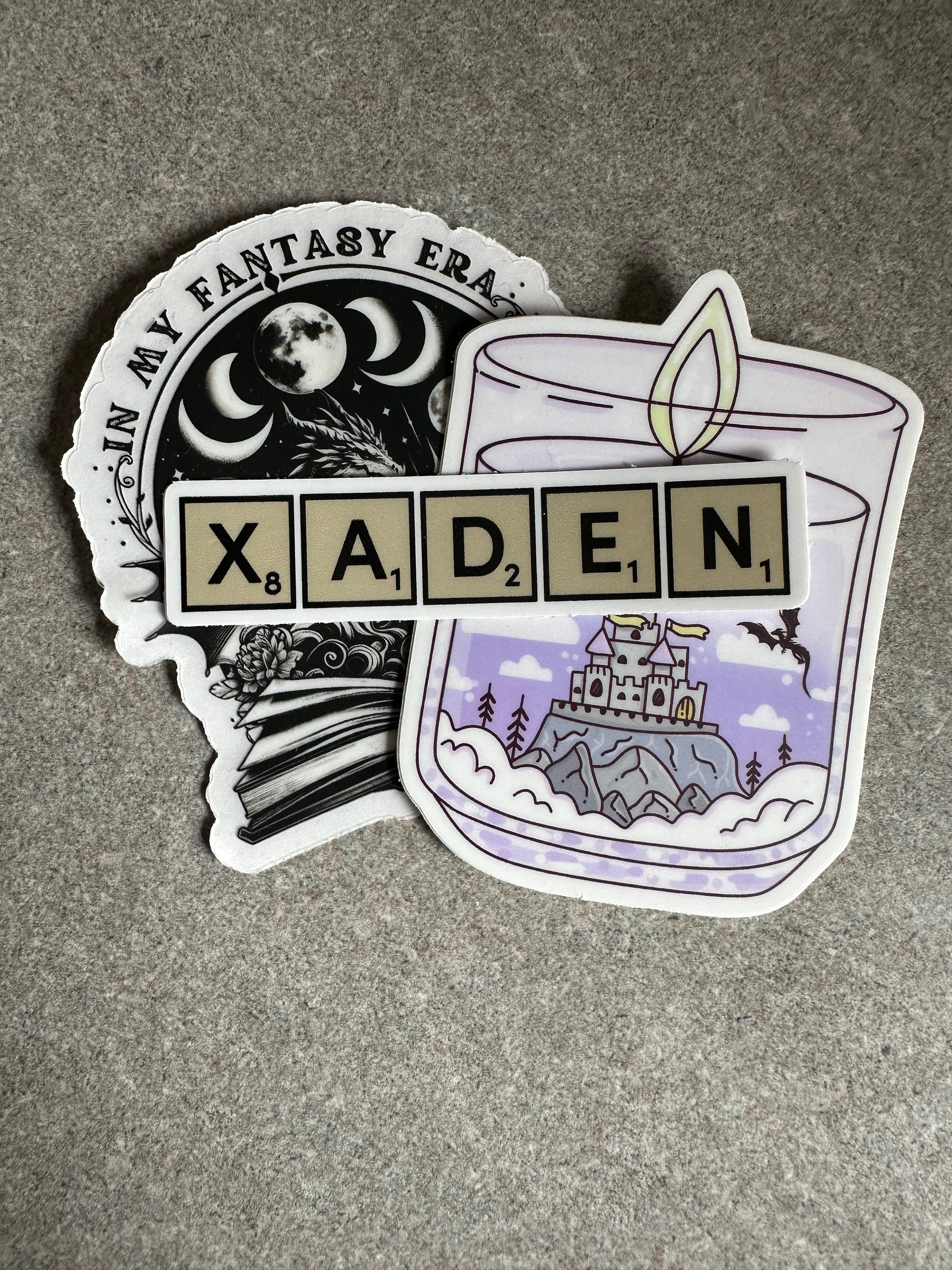 Xaden Game Tiles Vinyl Sticker, 3.0” x 0.68”